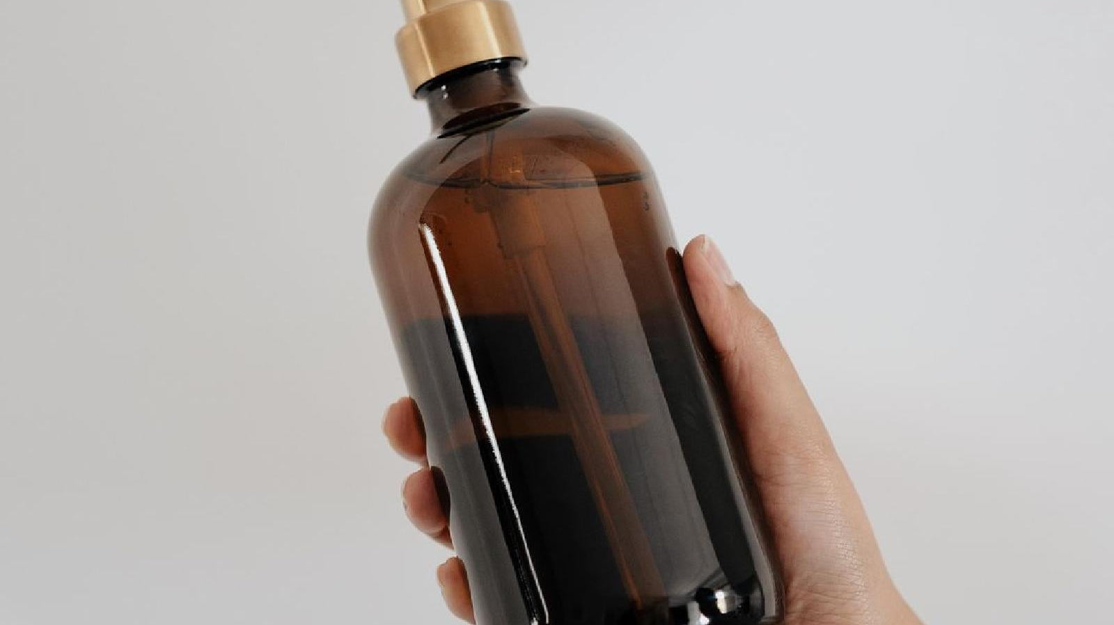 Amber glass soap dispenser bottles