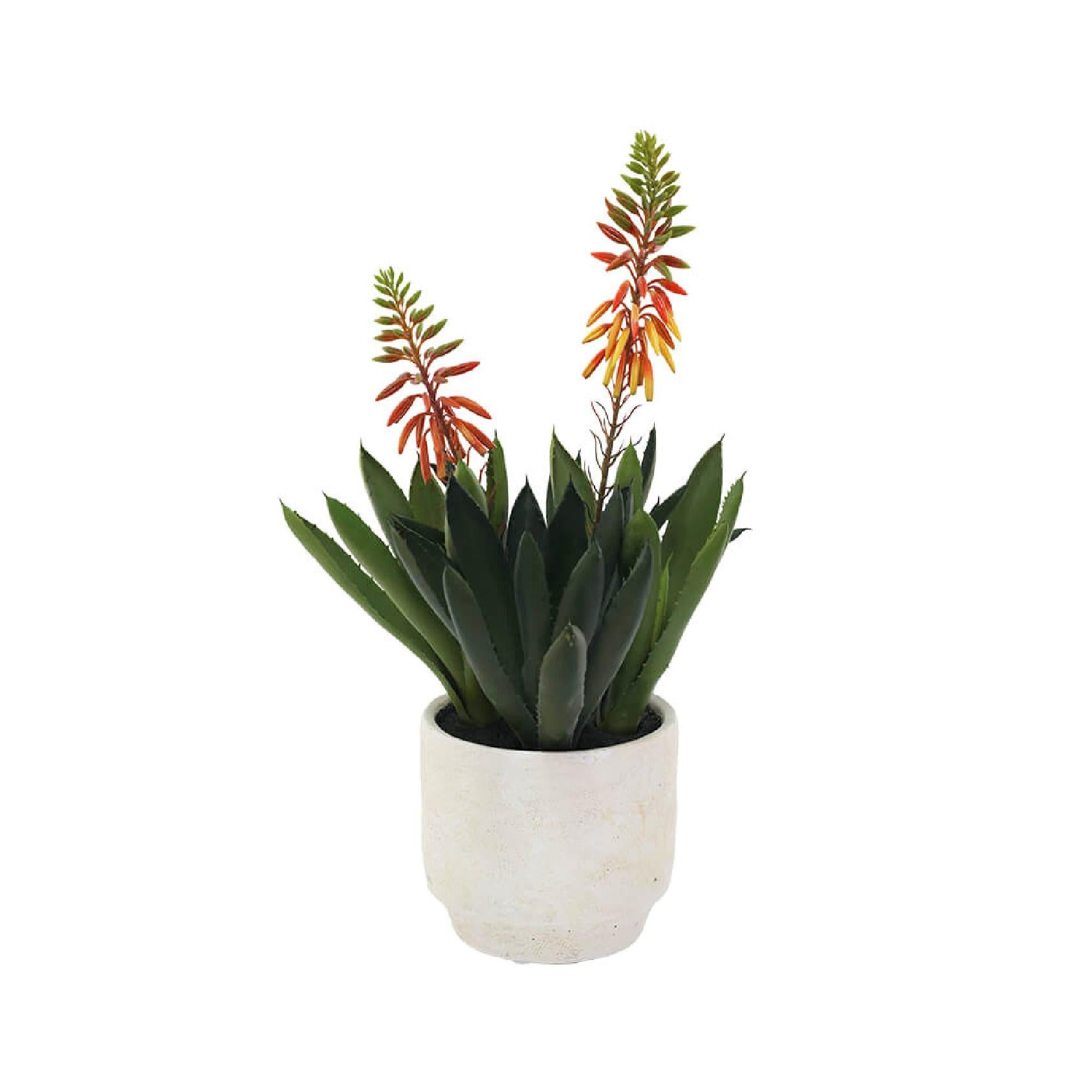 An artificial succulent plant with green leaves and orange-red flower spikes, potted in a ceramic pot