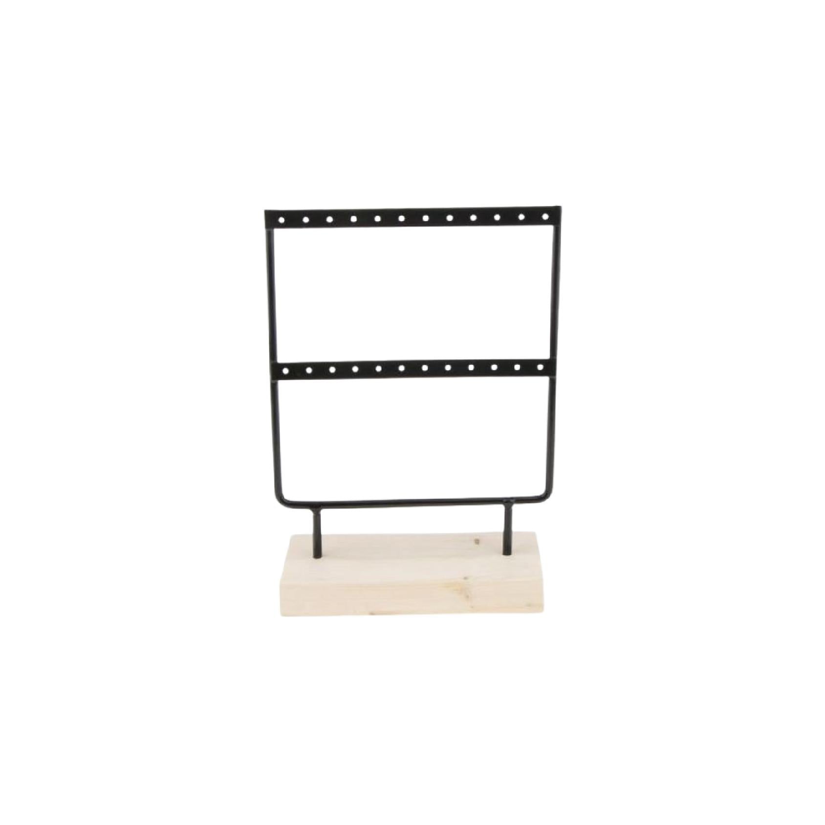 Black metal earring display stand with two rows of holes, mounted on a natural wood base