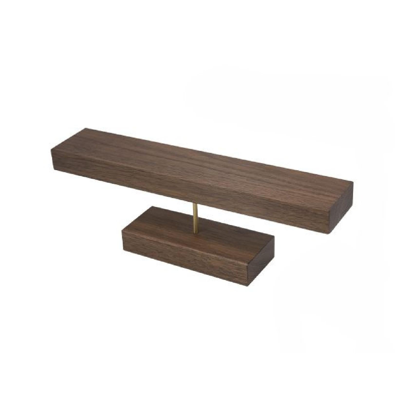 Dark wood square bracelet display bar with a gold metal bar