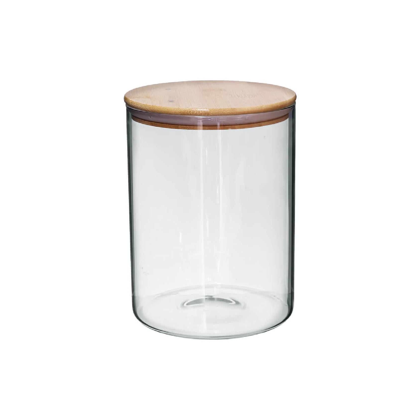 Clear glass storage jar with a wooden lid