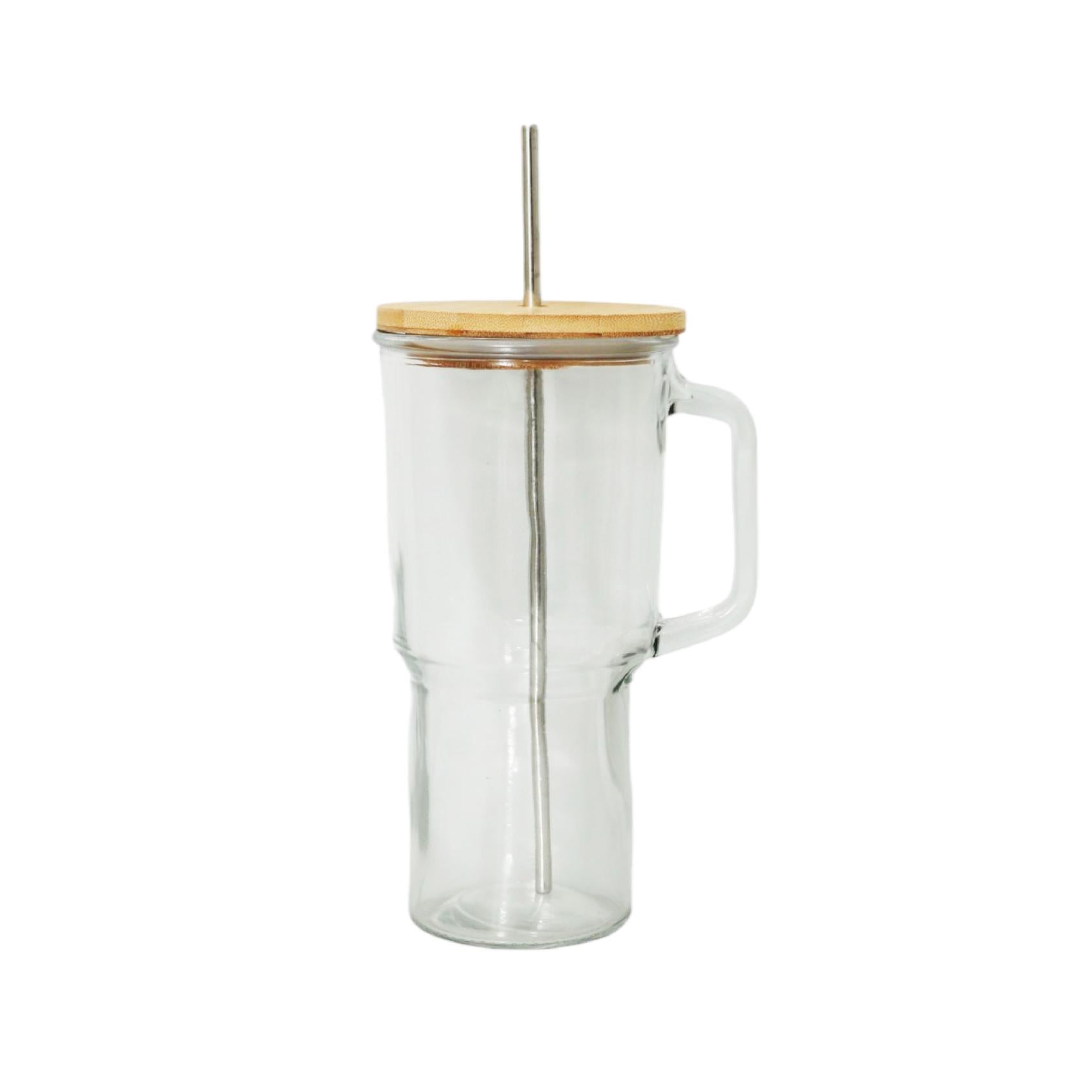 Glass tumbler with bamboo lid and straw