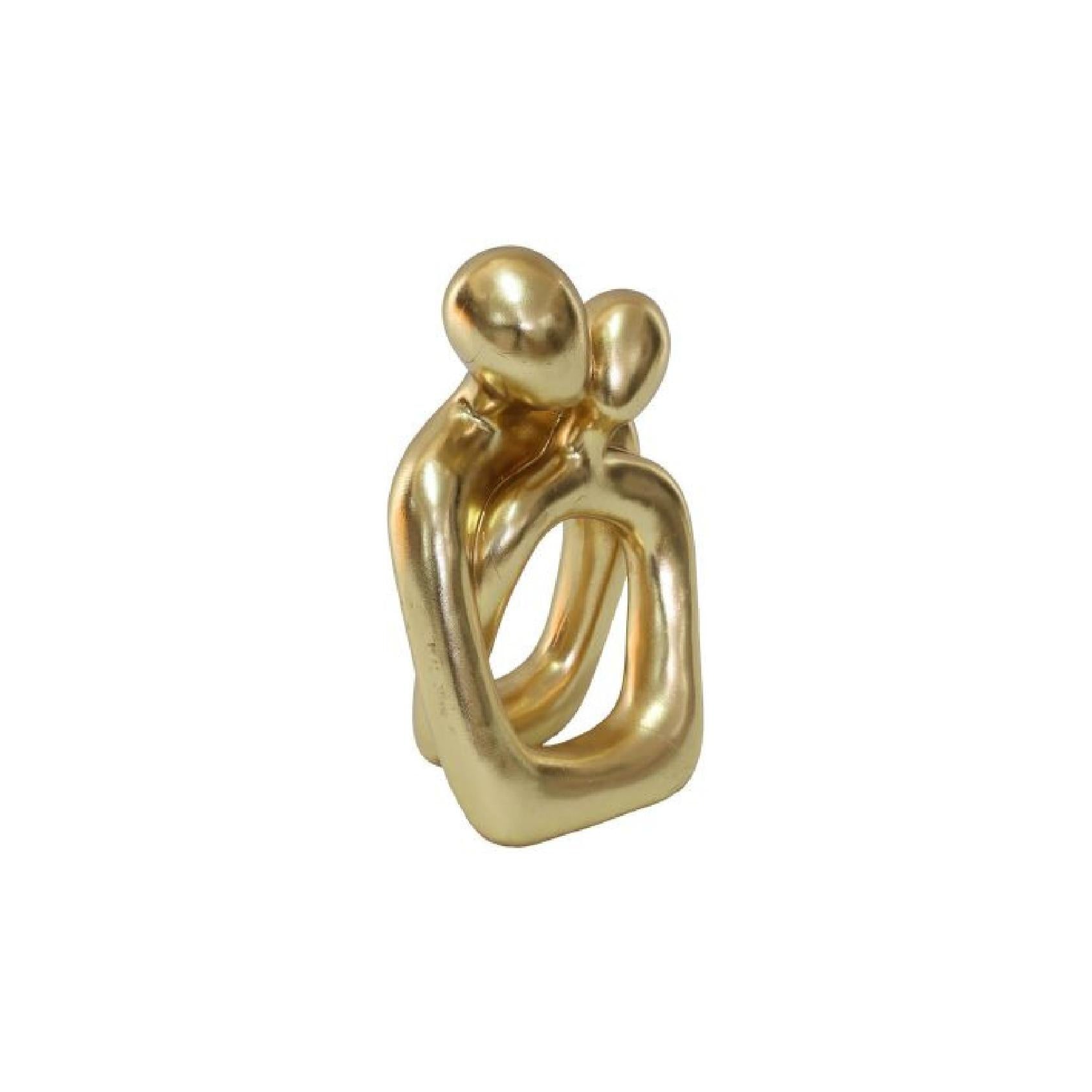 Gold abstract polystone sculpture of a couple