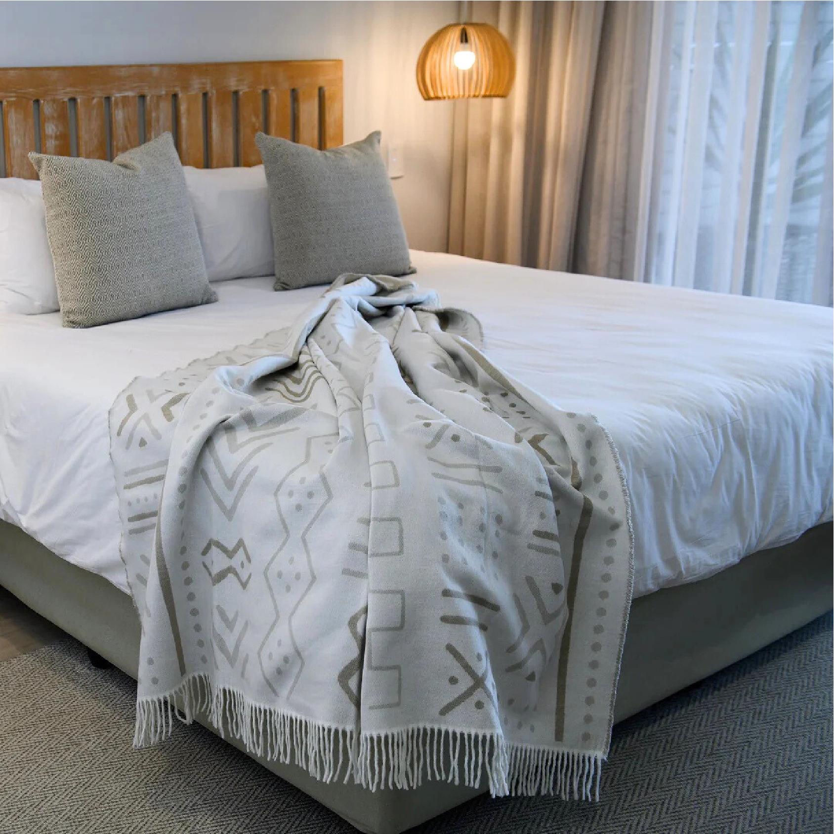 Mali oyster grey and cobblestone throw