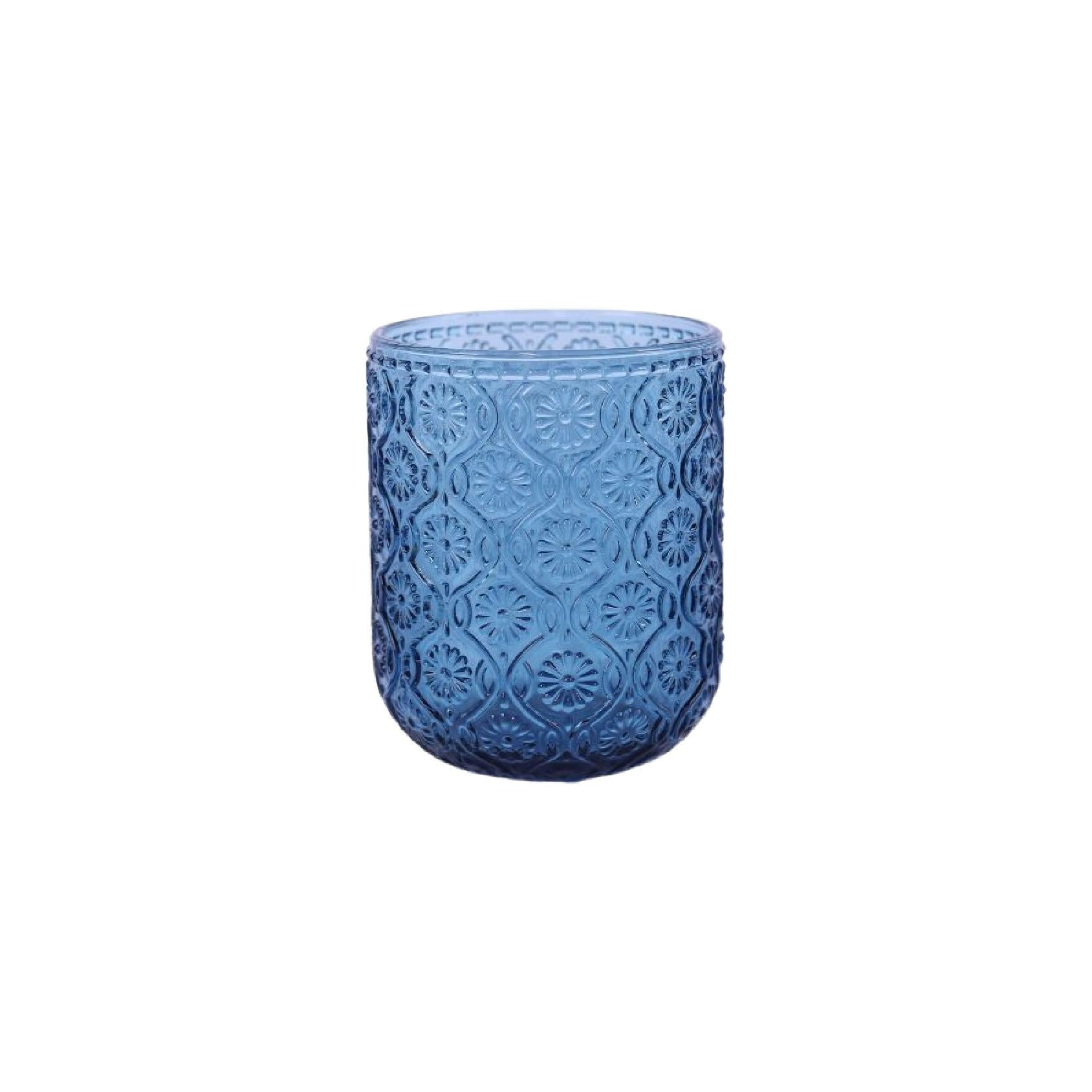 Blue glass tumbler with embossed pattern