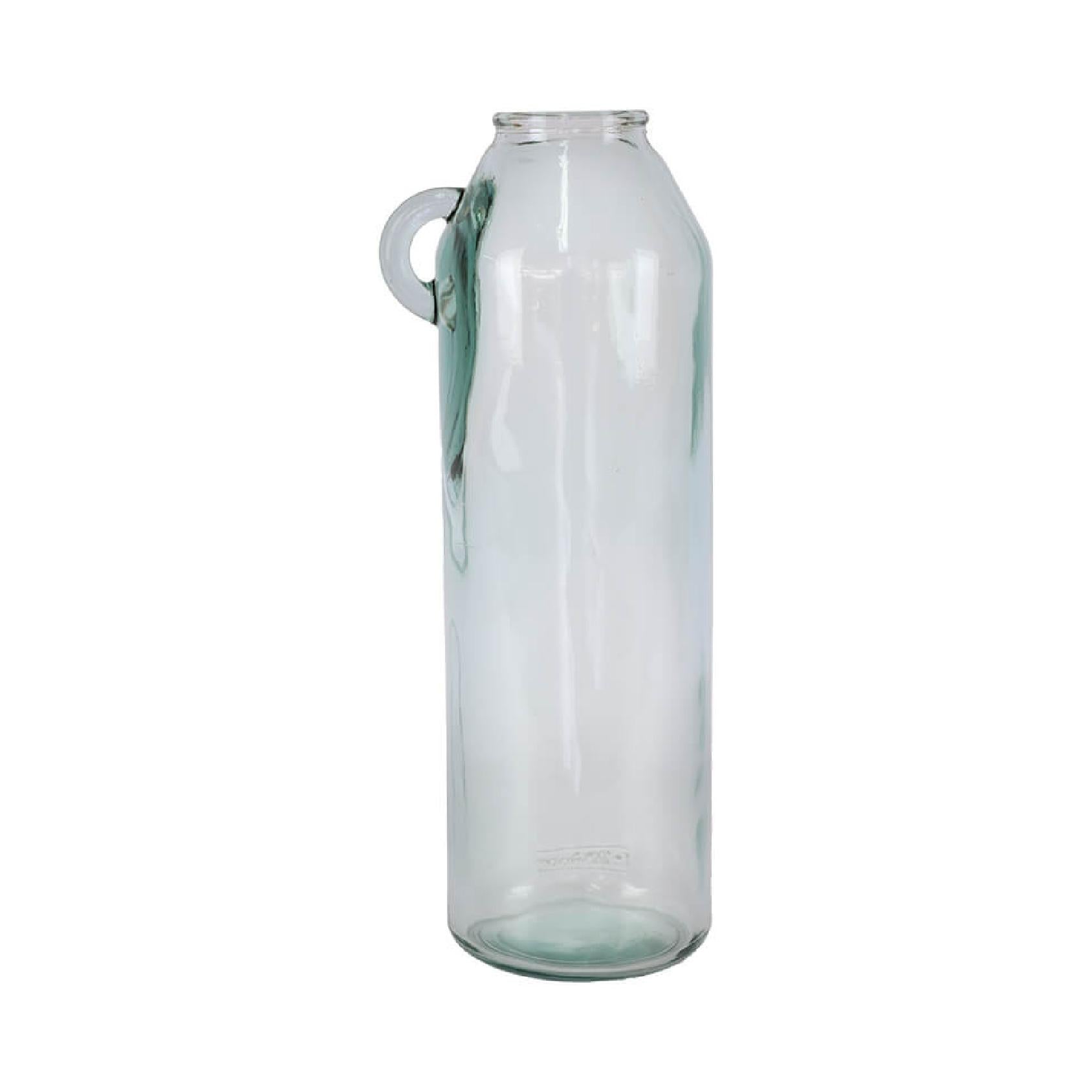 Translucent blue tall glass bottle-shaped vase