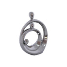 Silver ceramic abstract family sculpture with nested circular forms