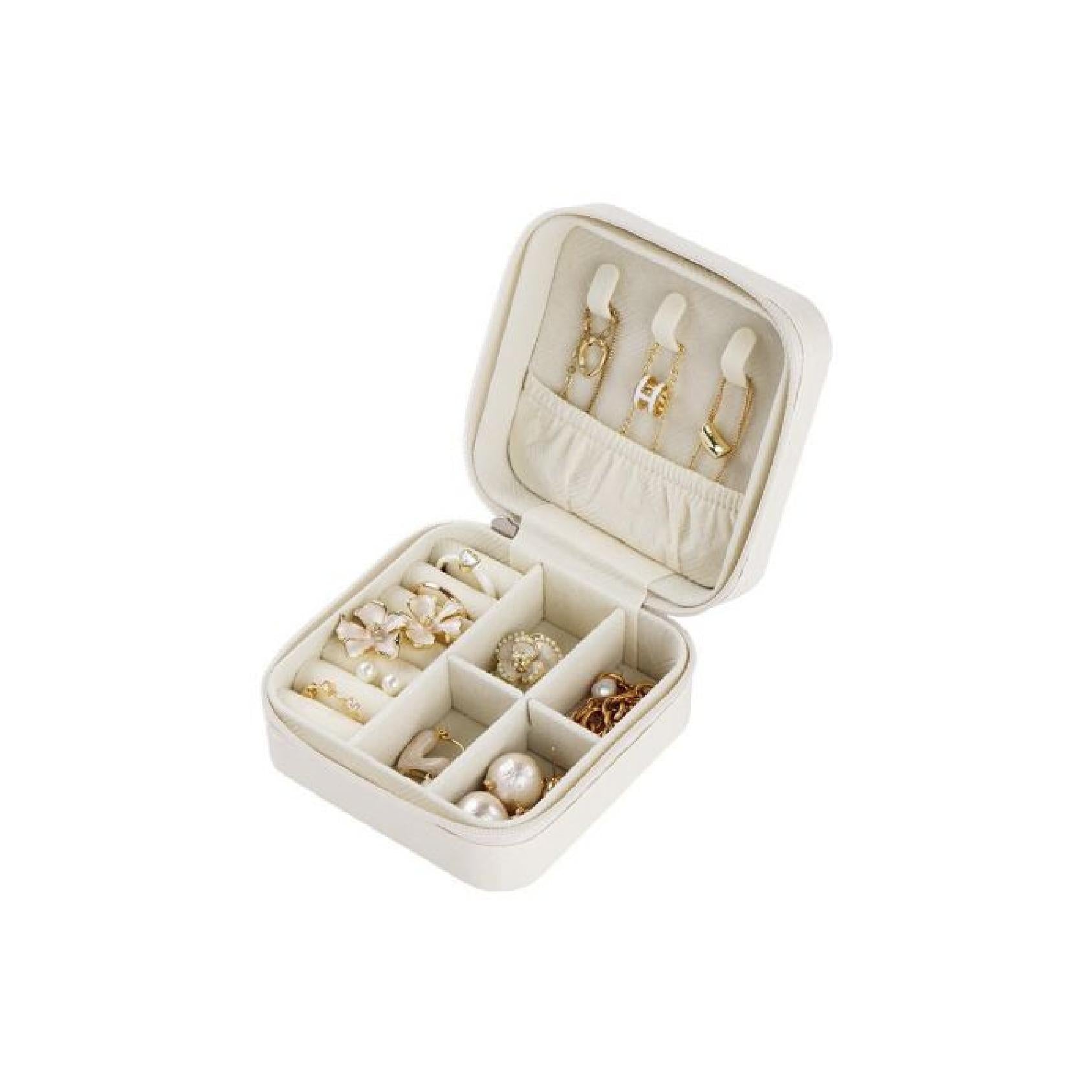 Ivory square zip-around jewellery travel case filled with jewellery