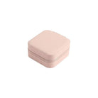 Pink square zip-around jewellery travel case closed