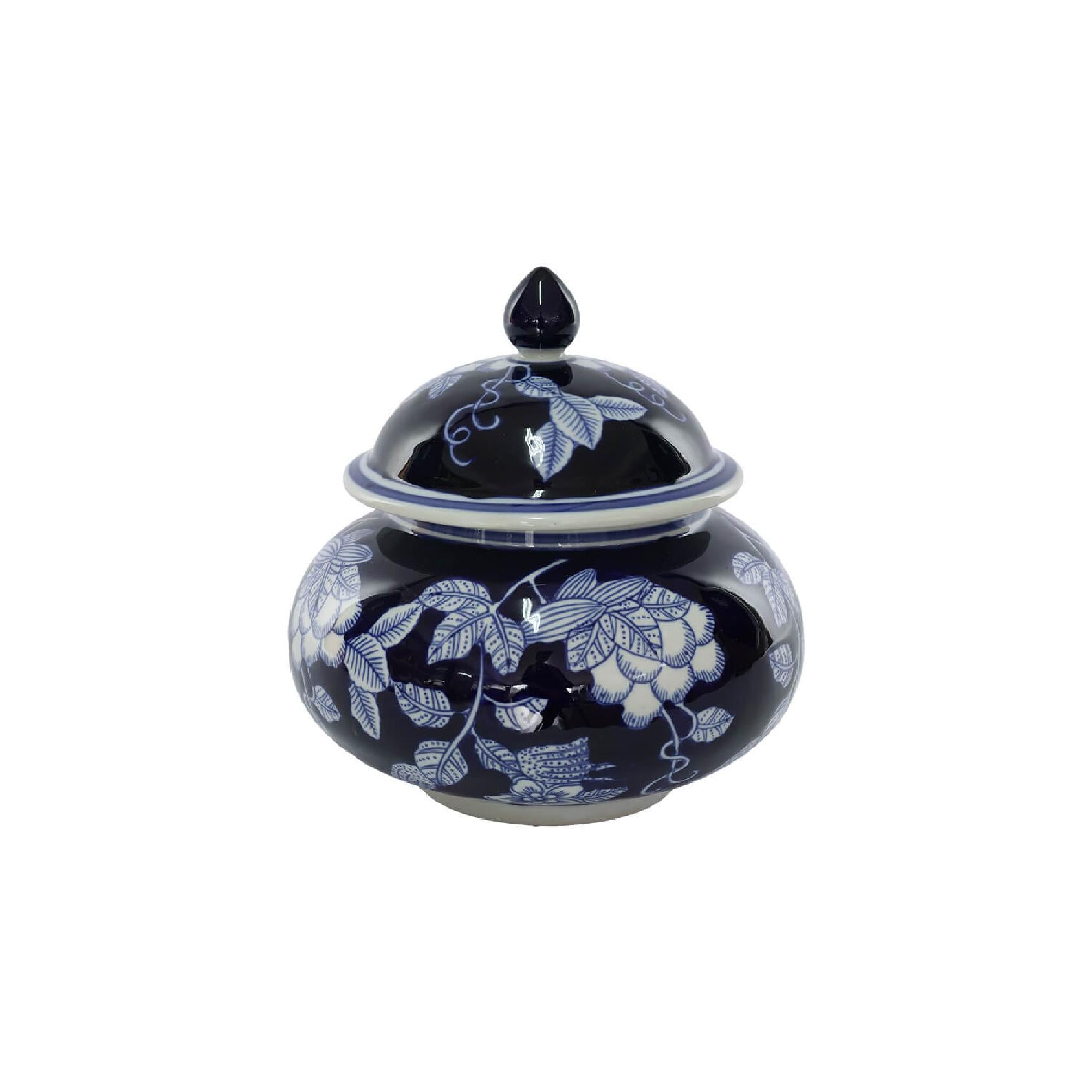 Ceramic jar with blue floral pattern and lid