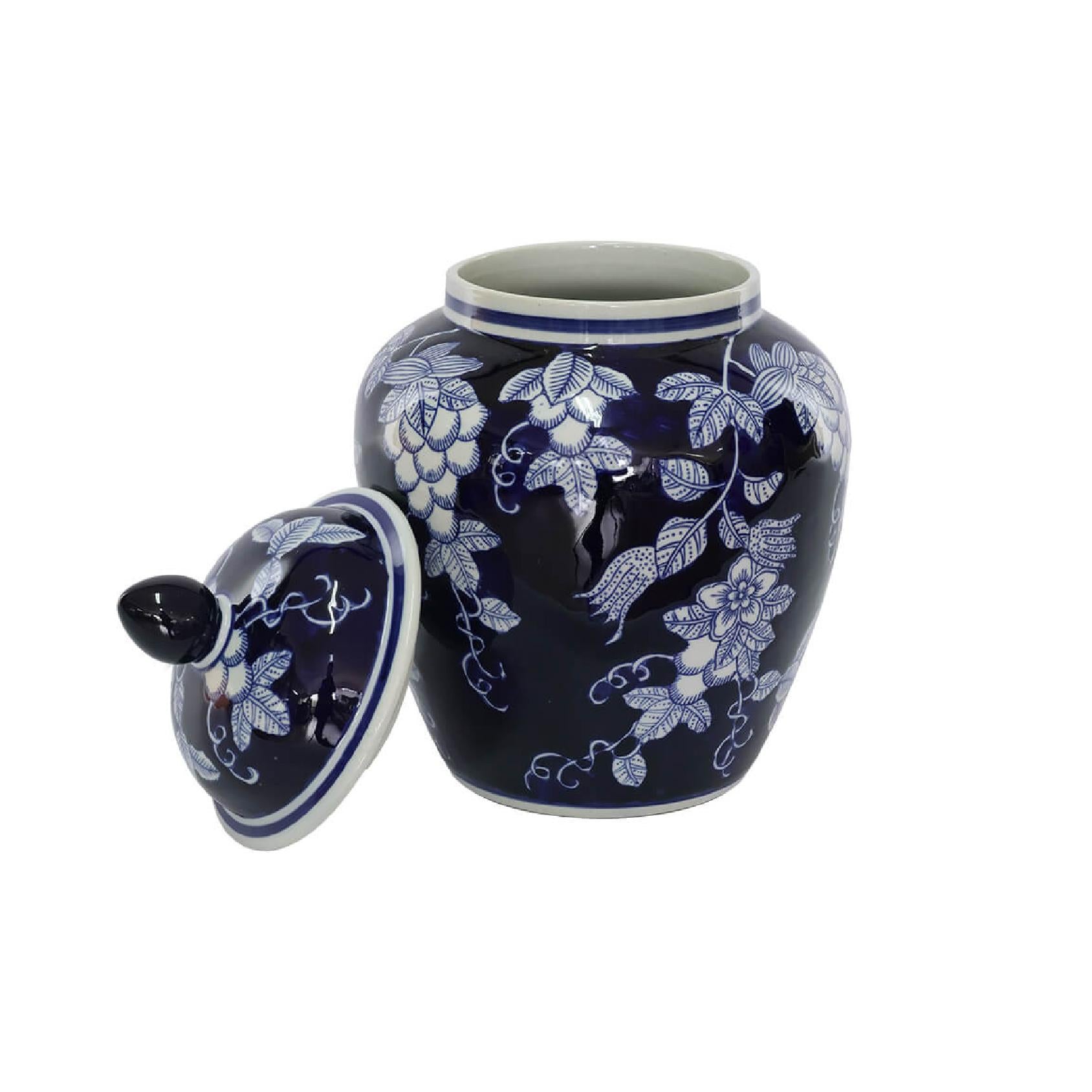 Ceramic jar with blue floral pattern and lid