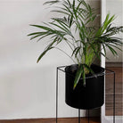 Black metal planter stand