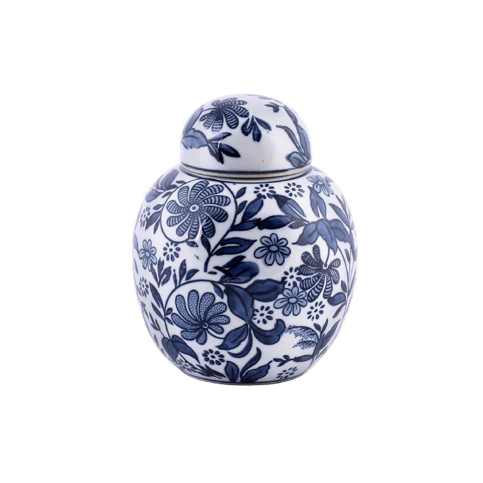 Glossed blue & white ceramic ginger jar with floral pattern & removable lid
