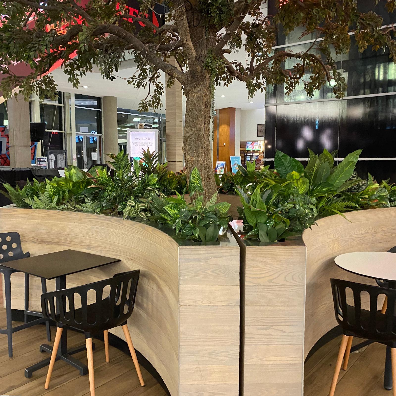Artificial plant installation at greenstone shopping centre