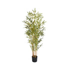 Artificial bamboo plant in a black plastic pot