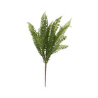 An artificial green fern stem with realistic fronds and a brown stem