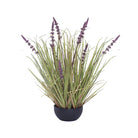 Potted artificial plant with purple lavender flowers and long green leaves