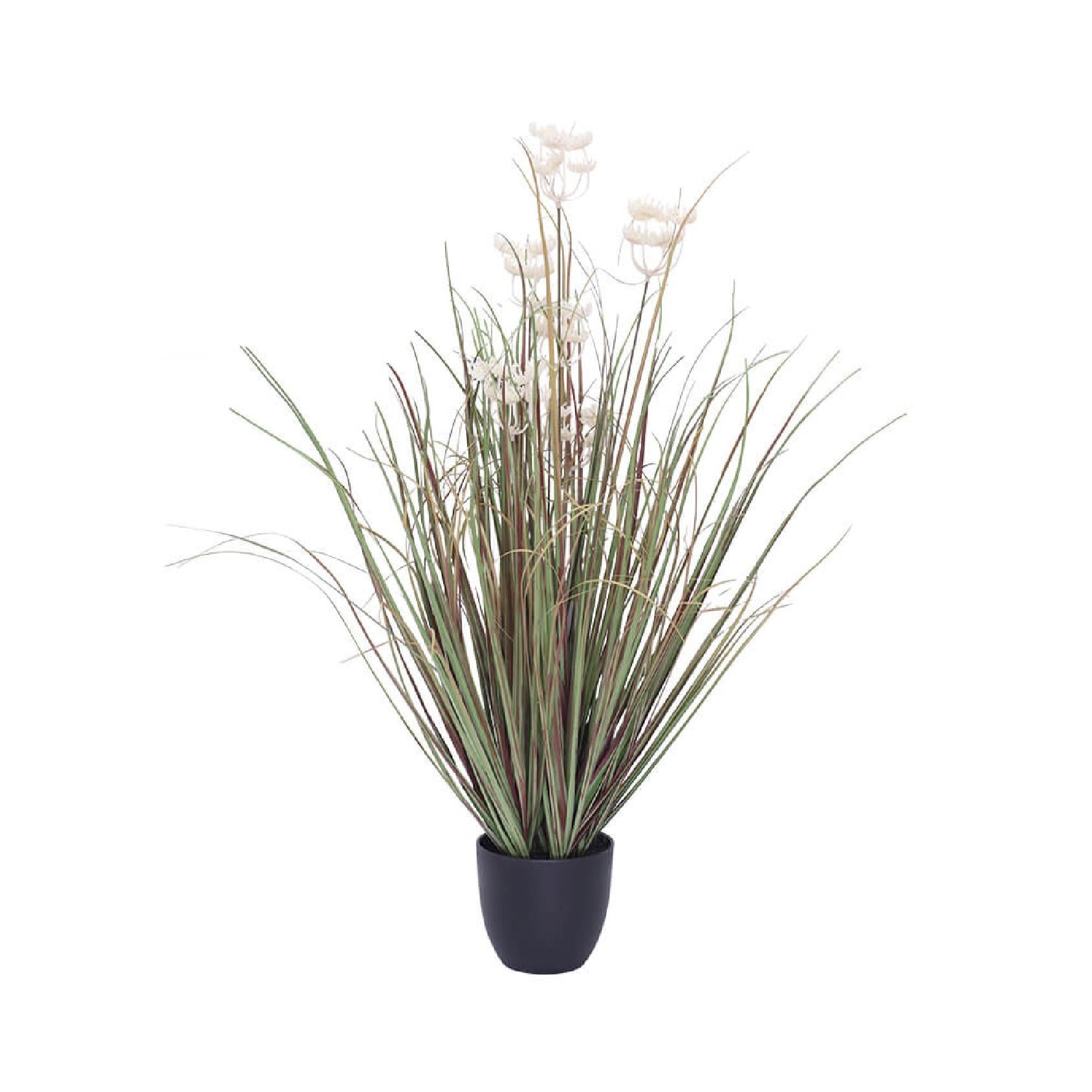 Artificial plant with long green leaves and white flowers in a black pot