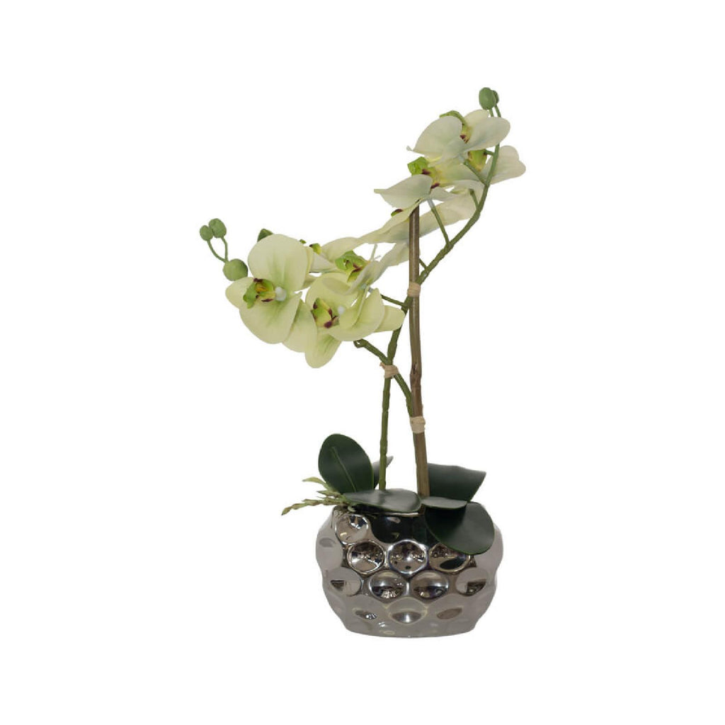 Artificial white orchid in silver ceramic pot