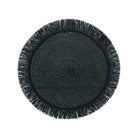 Black round placemat with fringed edge on a white background