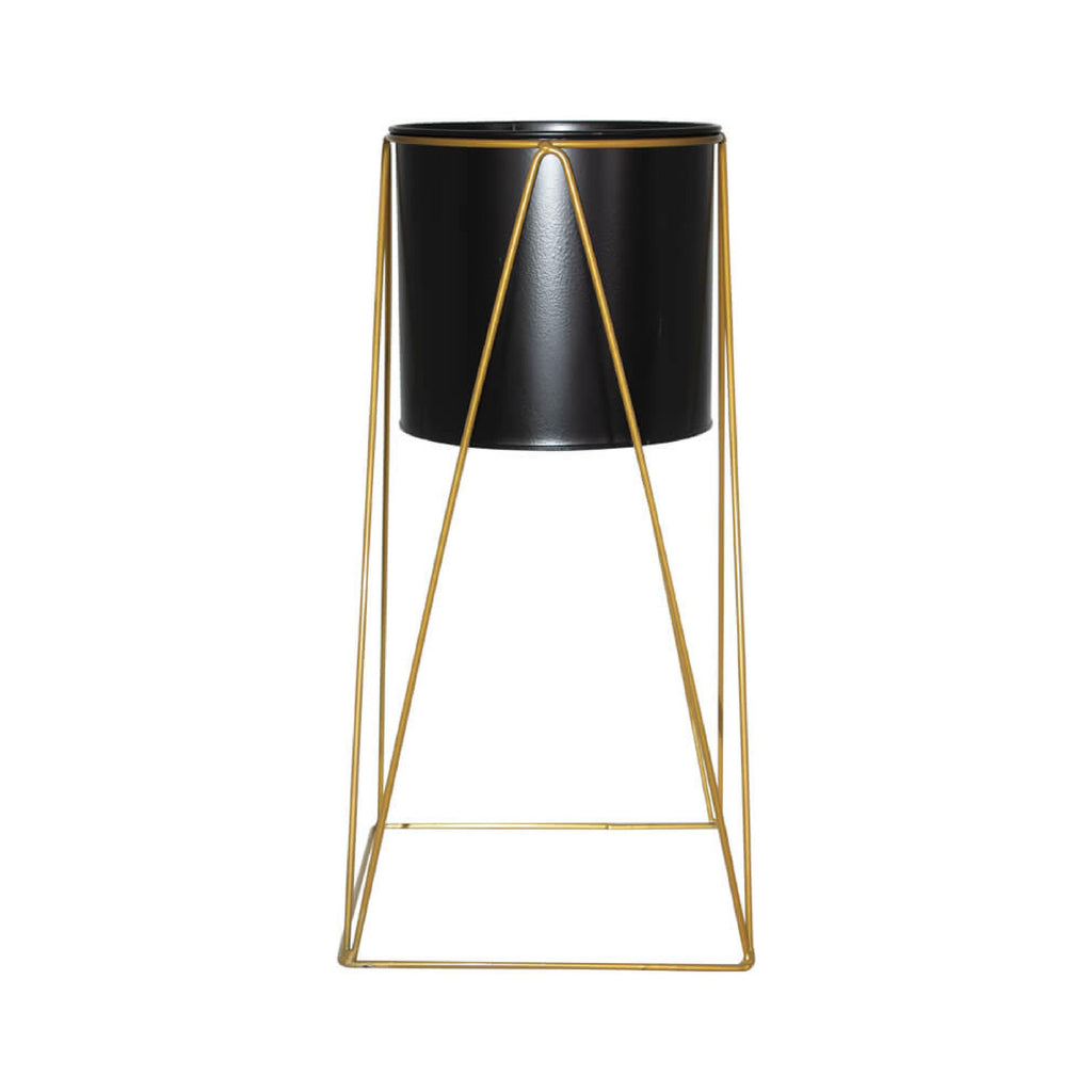 Black metal planter with gold stand