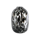 Glass vase with a black and white marbled pattern