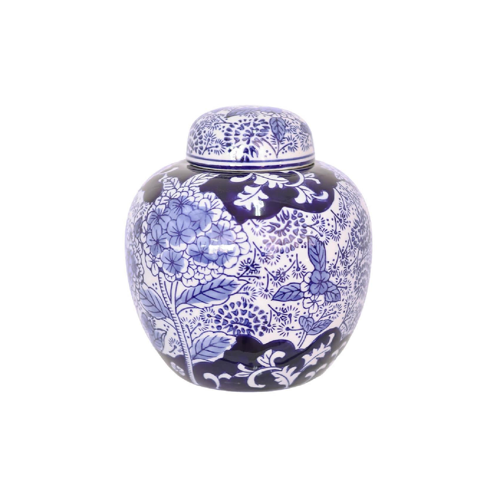 A blue and white patterned ceramic jar with a matching lid