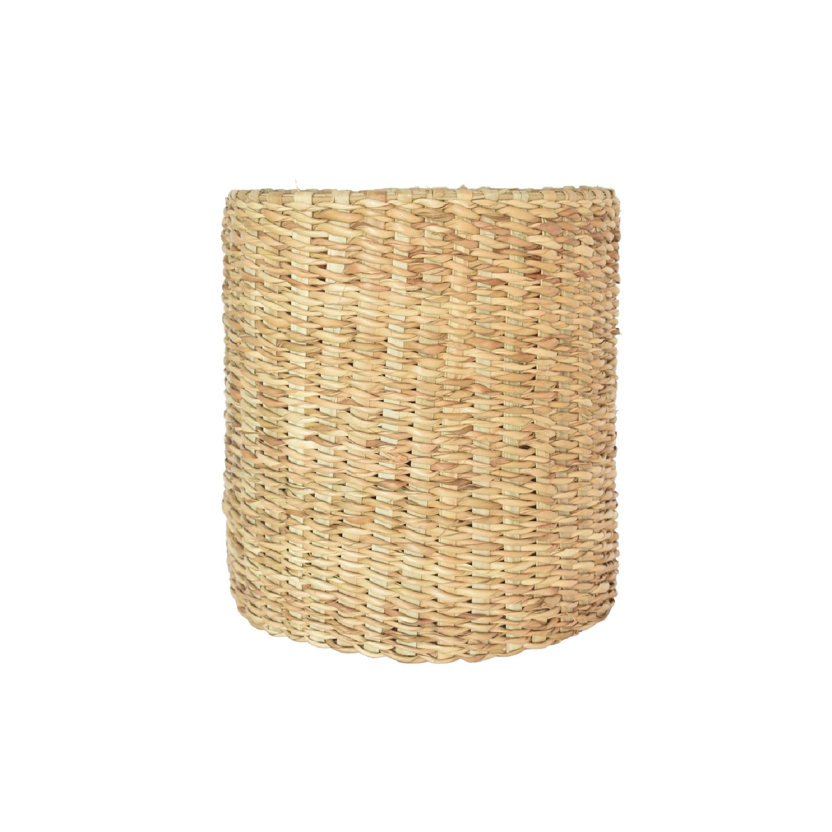 A cylindrical woven basket made from natural seagrass