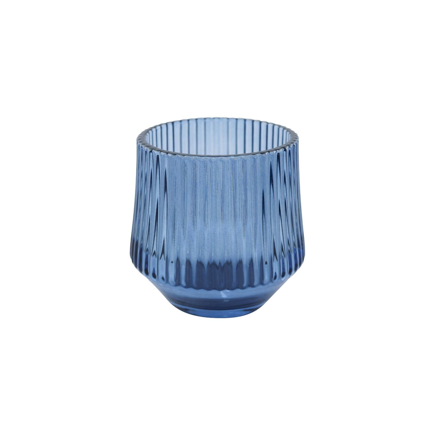 Blue glass votive with a ribbed design