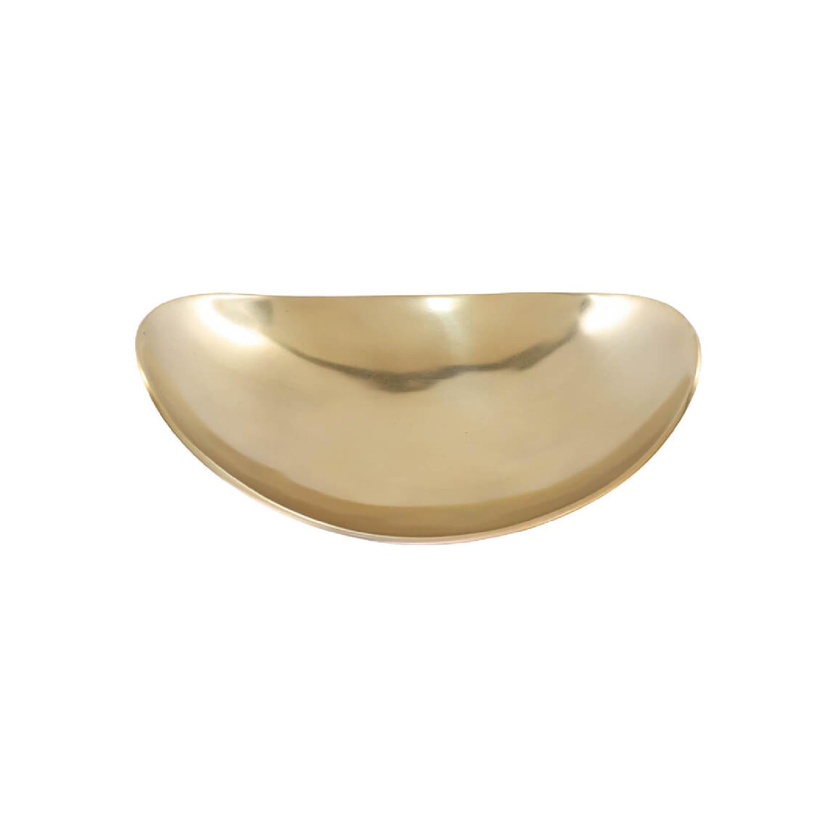 Metallic gold bowl with freeform shape