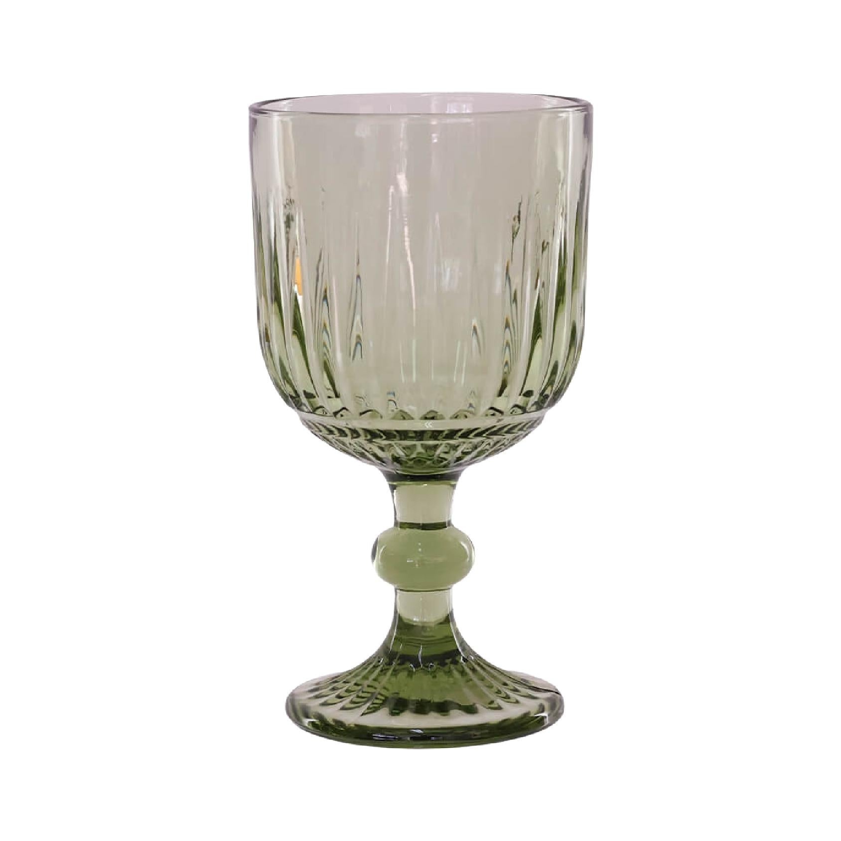 A green wine glass with a vertical ribbed pattern