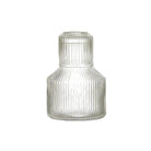 Ribbed glass carafe and tumbler