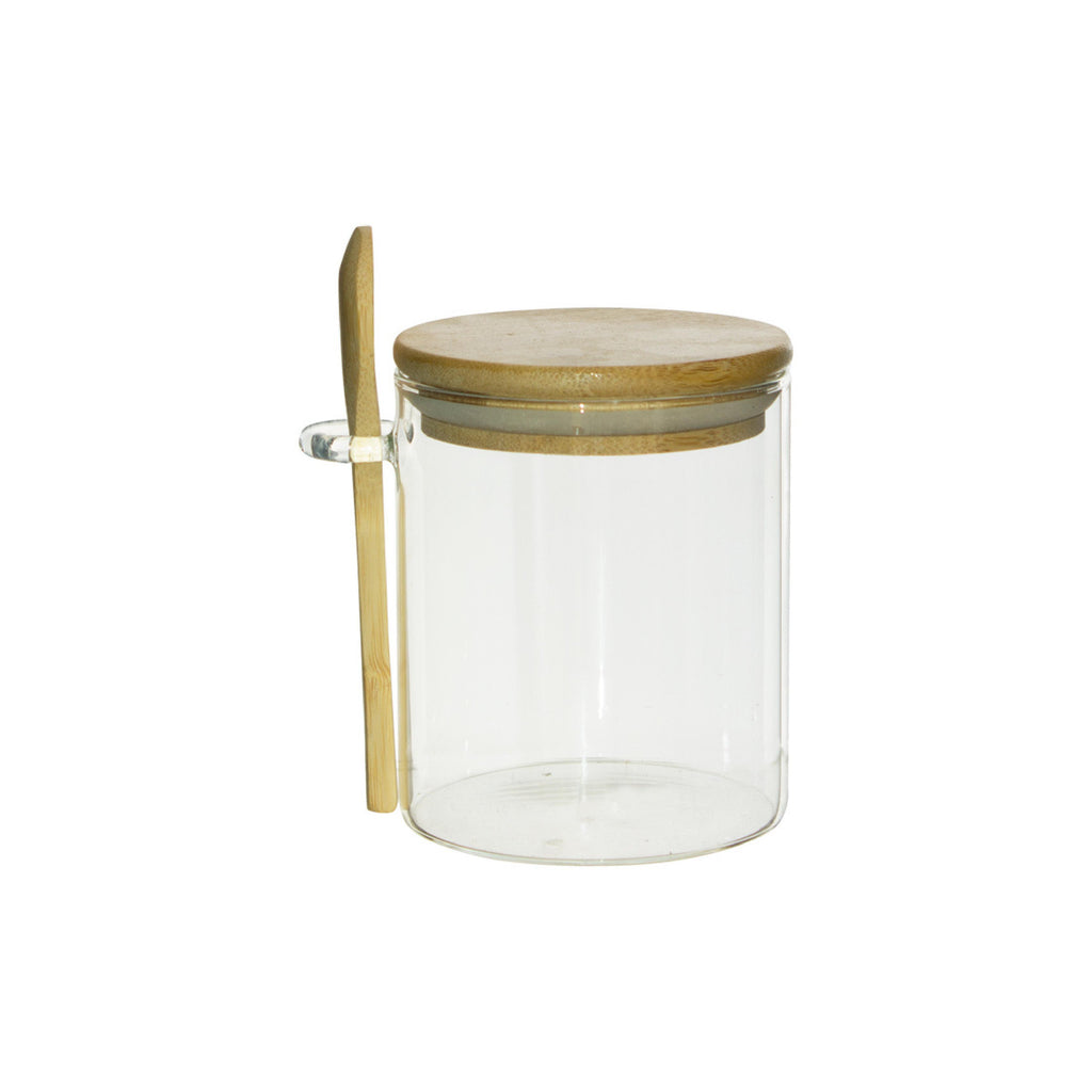 Glass storage jar with a bamboo lid and spoon