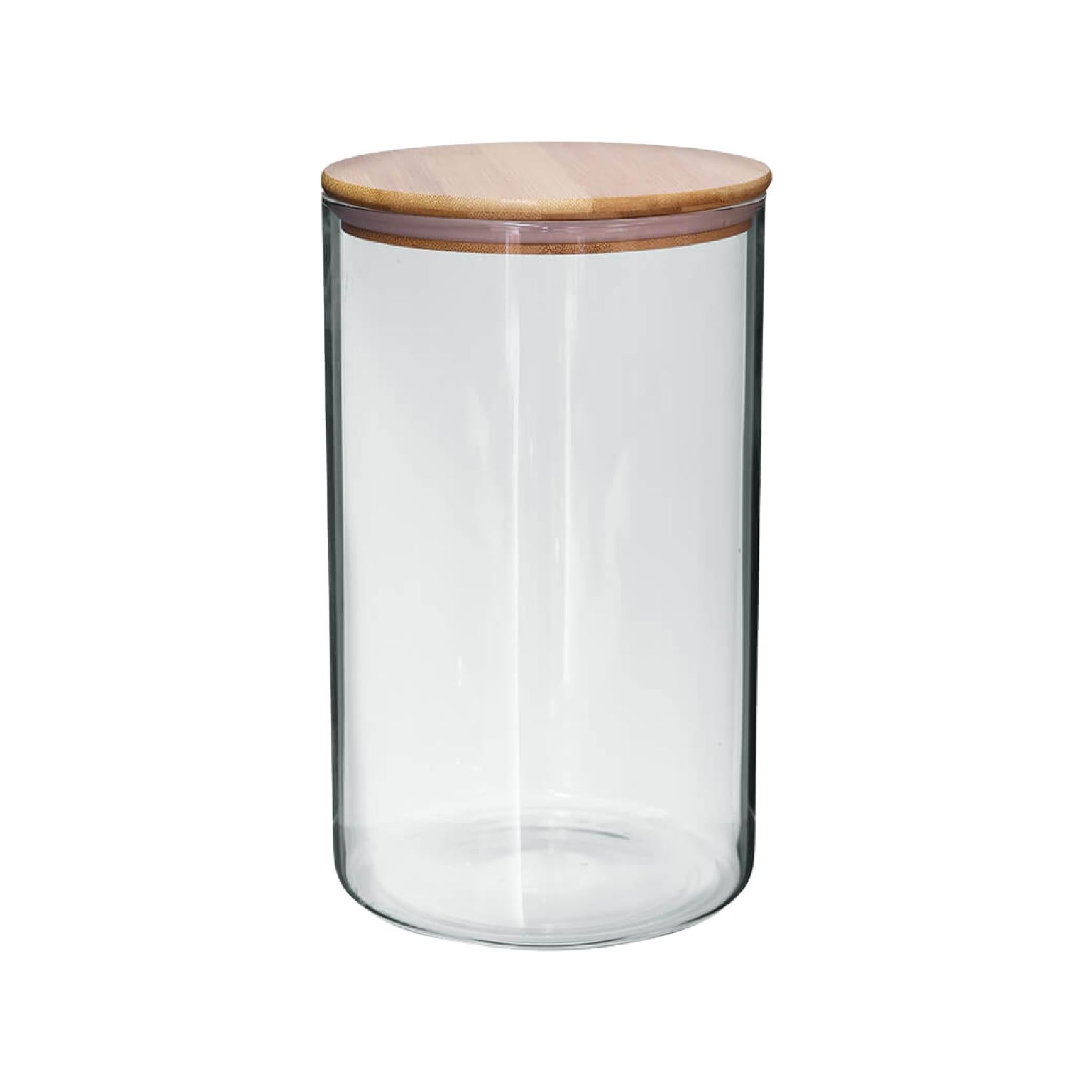 Clear glass storage jar with a wooden lid