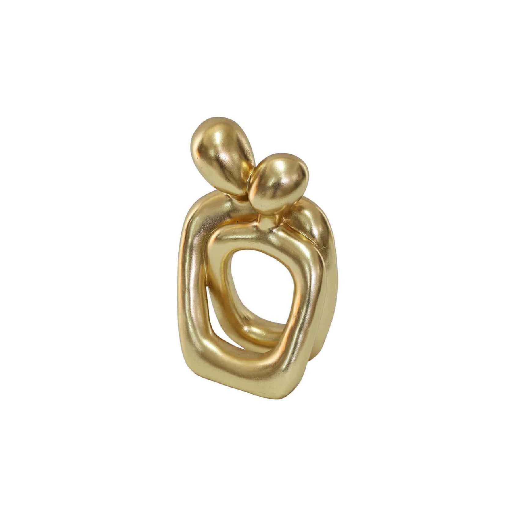 Gold abstract polystone sculpture of a couple