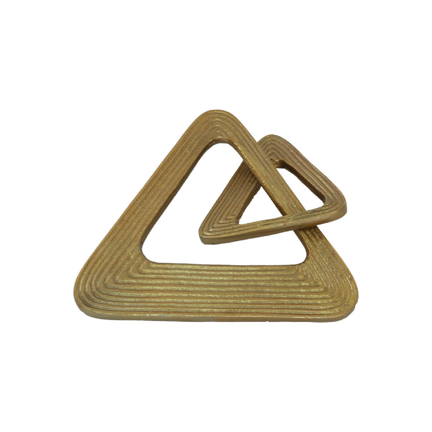 Gold metal decorative triangle object on a white background
