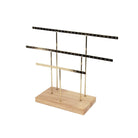 Gold and natural wood earring holder