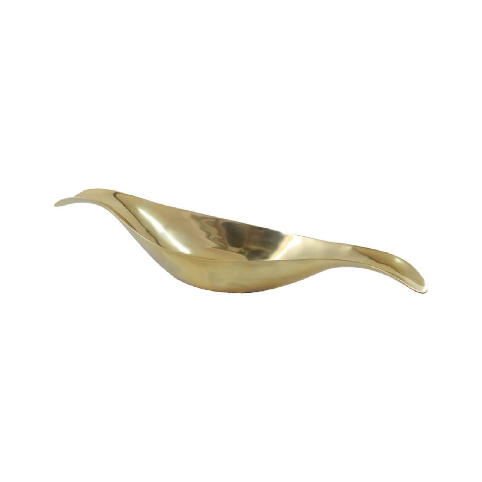 Elongated gold metal bowl with upturned edges