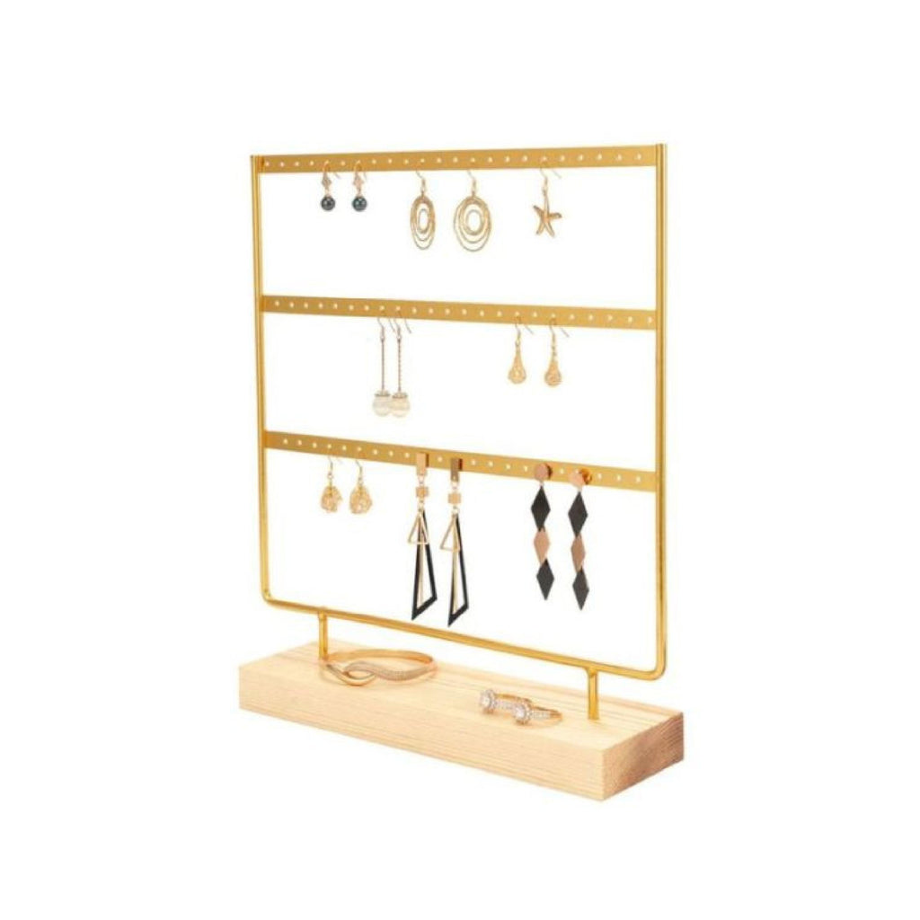 Gold and natural wood earring holder