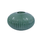 Green ribbed round glass vase