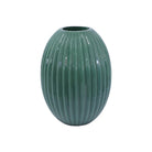 Green ribbed glass vase