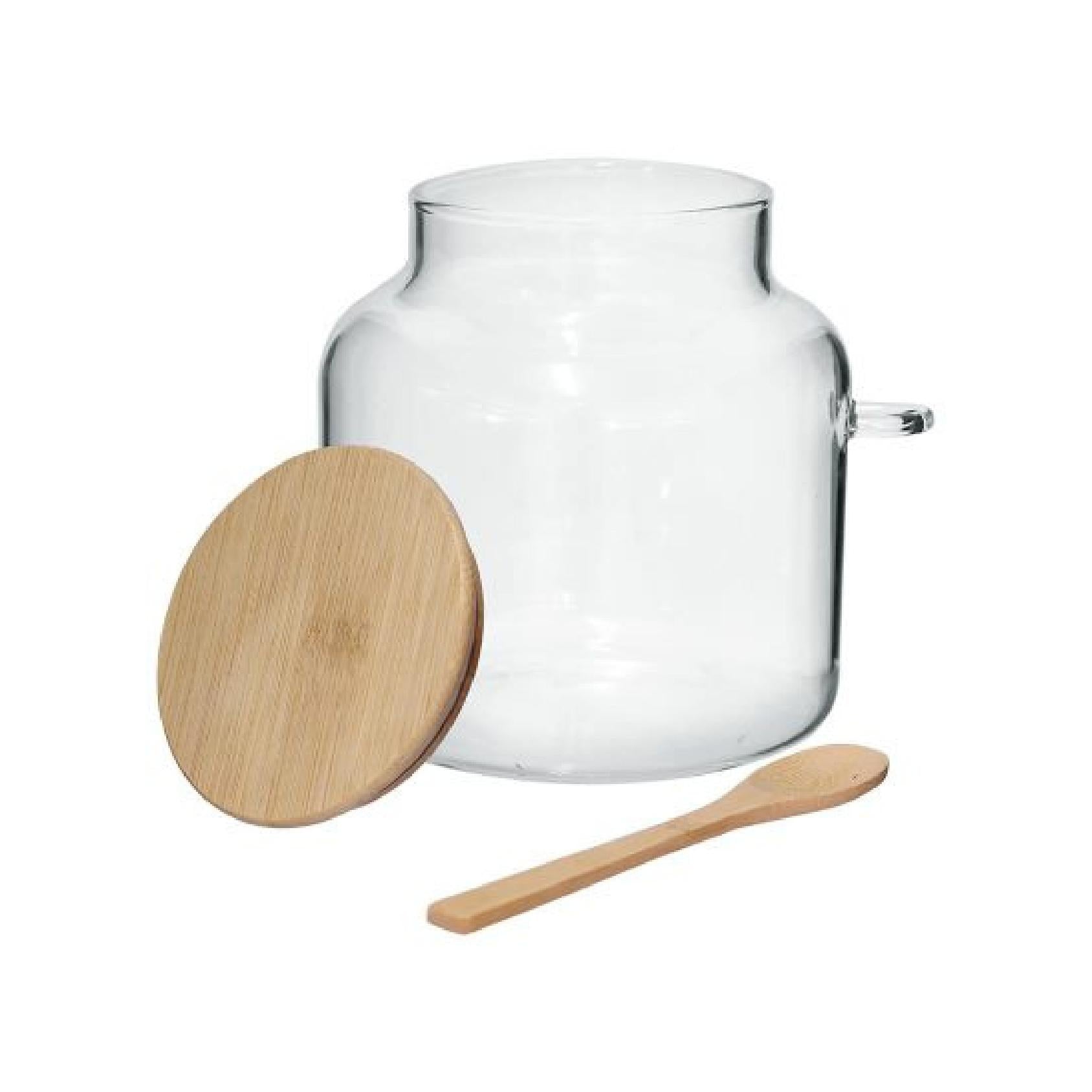 Large glass storage jar with matching wooden lid and spoon