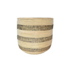 Woven basket with black stripes and a fitted lid