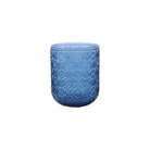 Blue glass tumbler with embossed pattern