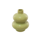 A small ceramic vase with a glossy green glaze