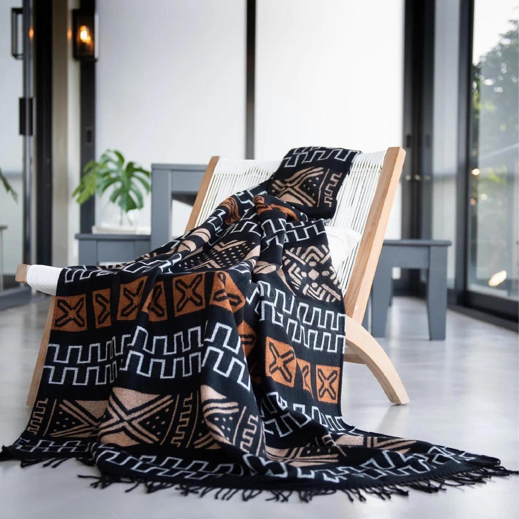 Mud cloth black and clay throw styled