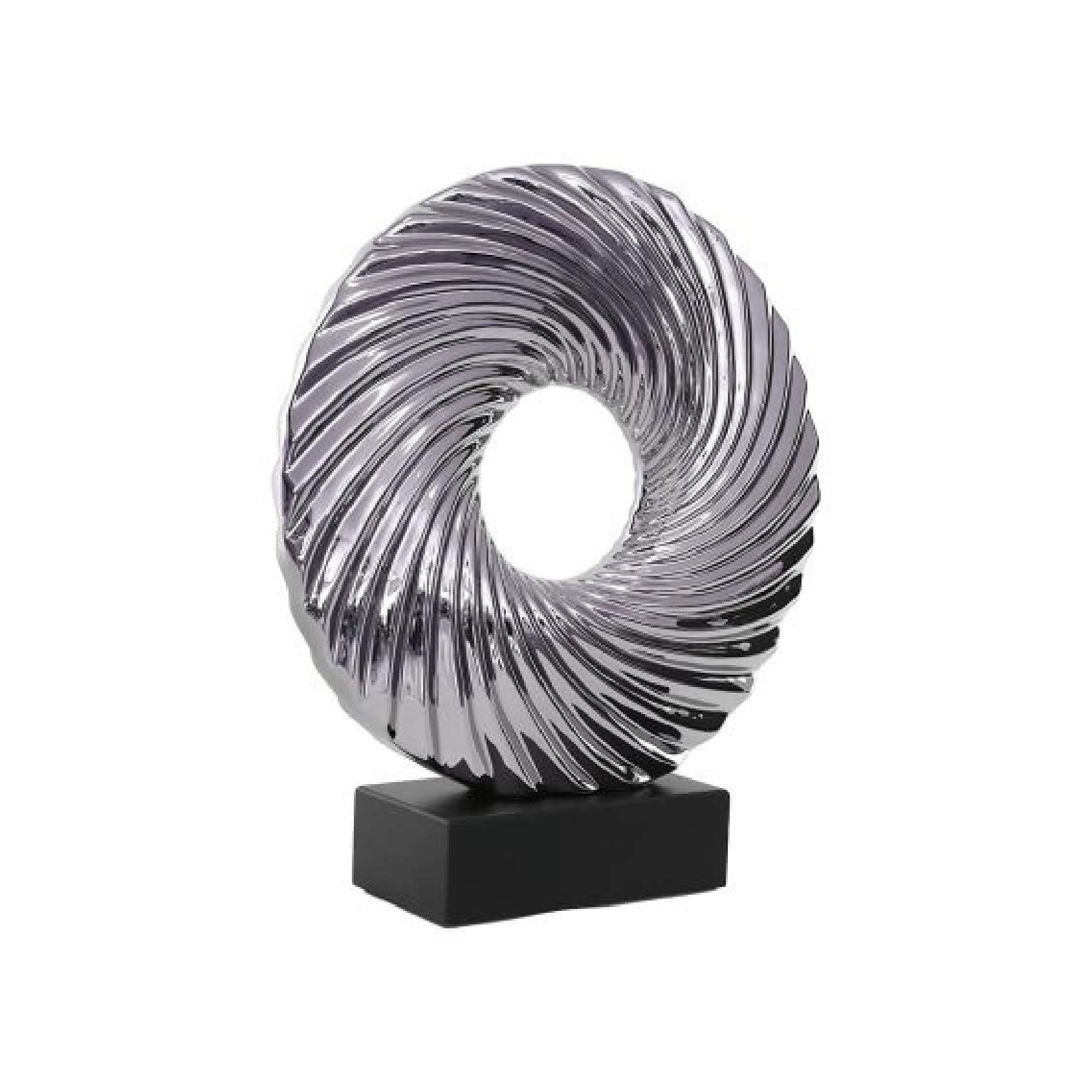 Decorative sculpture with a spiral design on a black base