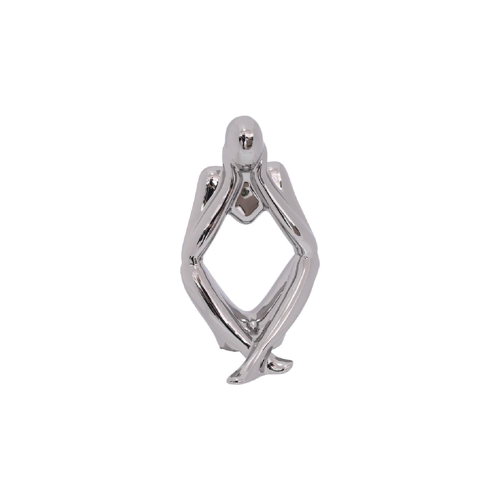 Silver ceramic thinking figurine