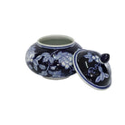 Ceramic jar with blue floral pattern and lid