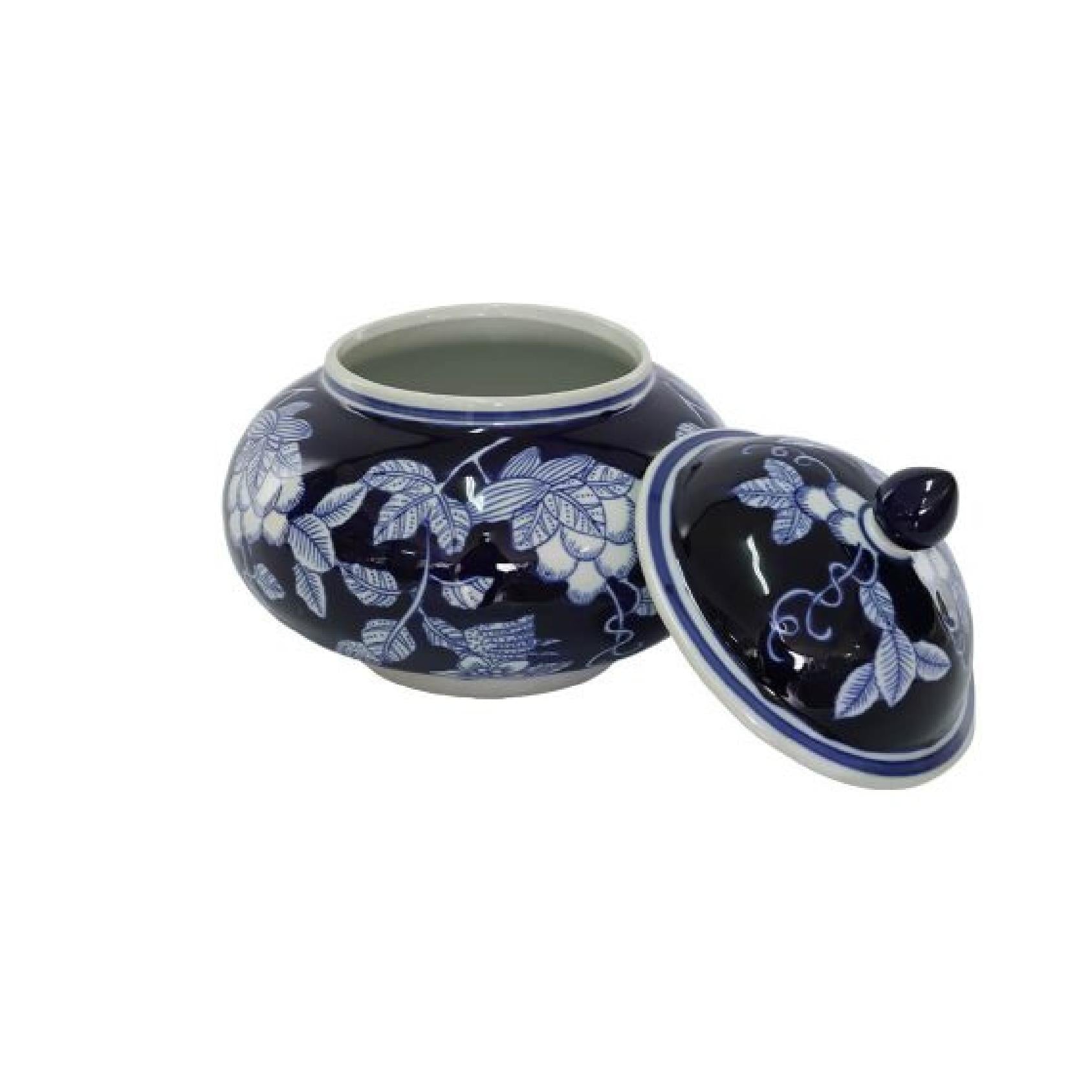 Ceramic jar with blue floral pattern and lid